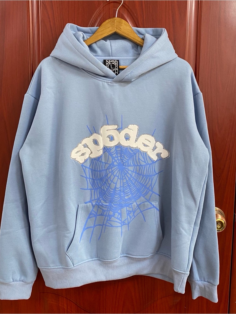 Unbranded Light Blue Graphic Hoodie with Spiderweb Design